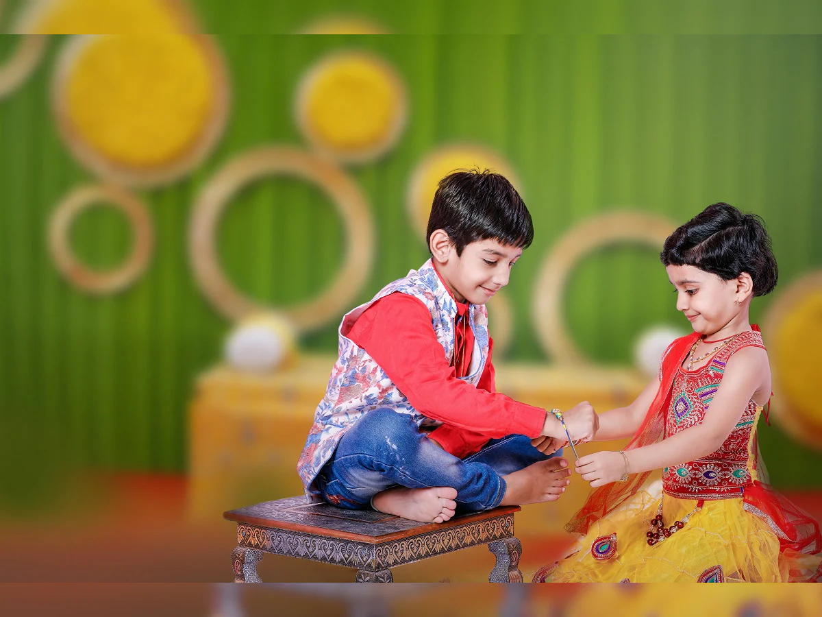 Sister tying Rakhi